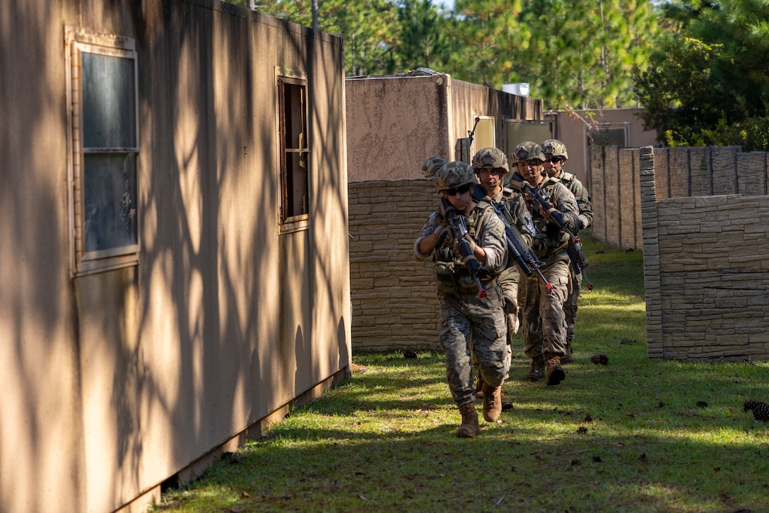 Marines with Infantería de Marina de la Armada de la República Argentina (Naval Infantry of the Argentine Navy) conduct urban terrain training during exercise UNITAS 2025 at Marine Corps Base Camp Lejeune, North Carolina, Sept. 19, 2025. UNITAS, which is Latin for “unity,” was conceived in 1959 and has taken place annually since first conducted in 1960. This year marks the 66th iteration of the world’s longest running annual multinational maritime exercise. (U.S. Marine Corps photo by Lance Cpl. Payton Goodrich)