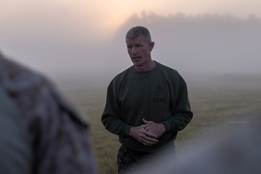 U.S. Marine Corps Brig. Gen. Kevin Jarrard, the commanding general of 4th Marine Division, speaks to Marines with 3rd Force Reconnaissance Company, 4th Marine Division, participating in sustainment jumps during exercise UNITAS 2025, Marine Corps Base Camp Lejeune at North Carolina, Sept. 20, 2025. UNITAS, which is Latin for “unity,” was conceived in 1959 and has taken place annually since first conducted in 1960. This year marks the 66th iteration of the world’s longest running annual multinational maritime exercise. (U.S. Marine Corps photo by Lance Cpl. Payton Goodrich)