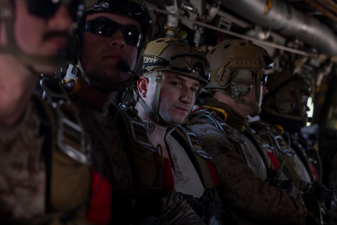 U.S. Marines with 3rd Force Reconnaissance Company, 4th Marine Division, and marines with Infantería de Marina del Perú (Peruvian naval infantry), Cuerpo de Infantería de Marina (Ecuadorian marines) and Infantería de Marina de la Armada de la República Argentina (Argentine marines) prepare to conduct sustainment jumps during exercise UNITAS 2025 at Marine Corps Base Camp Lejeune, North Carolina, Sept. 20, 2025. UNITAS, which is Latin for “unity,” was conceived in 1959 and has taken place annually since first conducted in 1960. This year marks the 66th iteration of the world’s longest running annual multinational maritime exercise. (U.S. Marine Corps photo by Lance Cpl. Payton Goodrich)