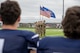 Members of the Minot Air Force Base honor guard present the colors during the national anthem before the Minot North High School football game at Sentinel Stadium in Minot, North Dakota, Sept. 20, 2025. The ceremony preceded a UH-1 Iroquois arrival carrying 5th Bomb Wing and 91st Missile Wing leadership for the game’s opening kickoff. (U.S. Air Force photo by Senior Airman Luis Gomez)