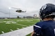 A UH-1 Iroquois assigned to the 54th Helicopter Squadron approaches Sentinel Stadium carrying 5th Bomb Wing and 91st Missile Wing leadership for the Minot North High School football game in Minot, North Dakota, Sept. 20, 2025. Team Minot leadership delivered the game ball as part of the pre-game ceremonies highlighting the partnership between Team Minot and the local community. (U.S. Air Force photo by Senior Airman Luis Gomez)