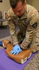 Soldiers from the Harrisburg Recruiting Battalion, practice CPR and AED use during American Red Cross Instructor-Led Training. (photo by Cynthia Stephenson)