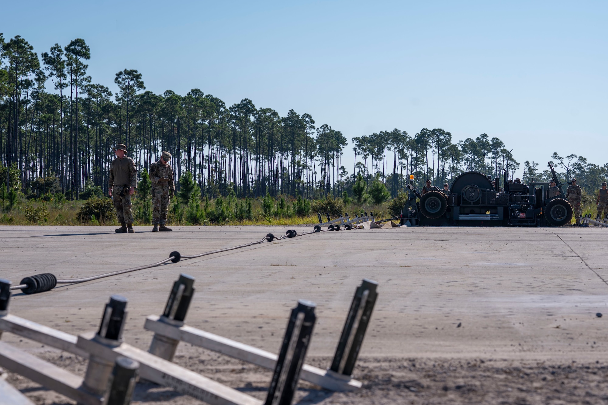 Airmen assigned to the 723d Combat Air Base Squadron operate an aircraft-arresting system at Tyndall Air Force Base, Fla., Sept. 15, 2025.