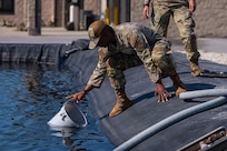 U.S. Air Force Chief Master Sgt. Anthony Thompson Jr., senior enlisted leader for Joint Base Anacostia-Bolling and the 11th Wing, pulls water for a training test at Tyndall Air Force Base, Fla., Sept. 15, 2025.