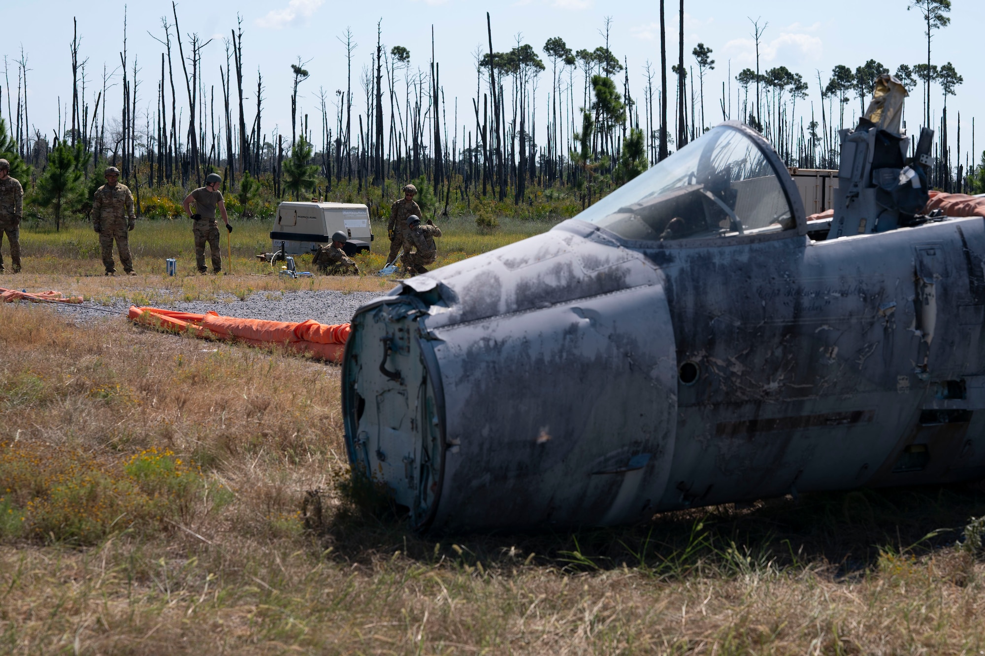Airmen assigned to the 723d Combat Air Base Squadron operate a crash damage disabled aircraft device to clear a simulated aircraft crash from a runway at Tyndall Air Force Base, Fla., Sept. 15, 2025.