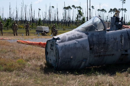 Airmen assigned to the 723d Combat Air Base Squadron operate a crash damage disabled aircraft device to clear a simulated aircraft crash from a runway at Tyndall Air Force Base, Fla., Sept. 15, 2025.