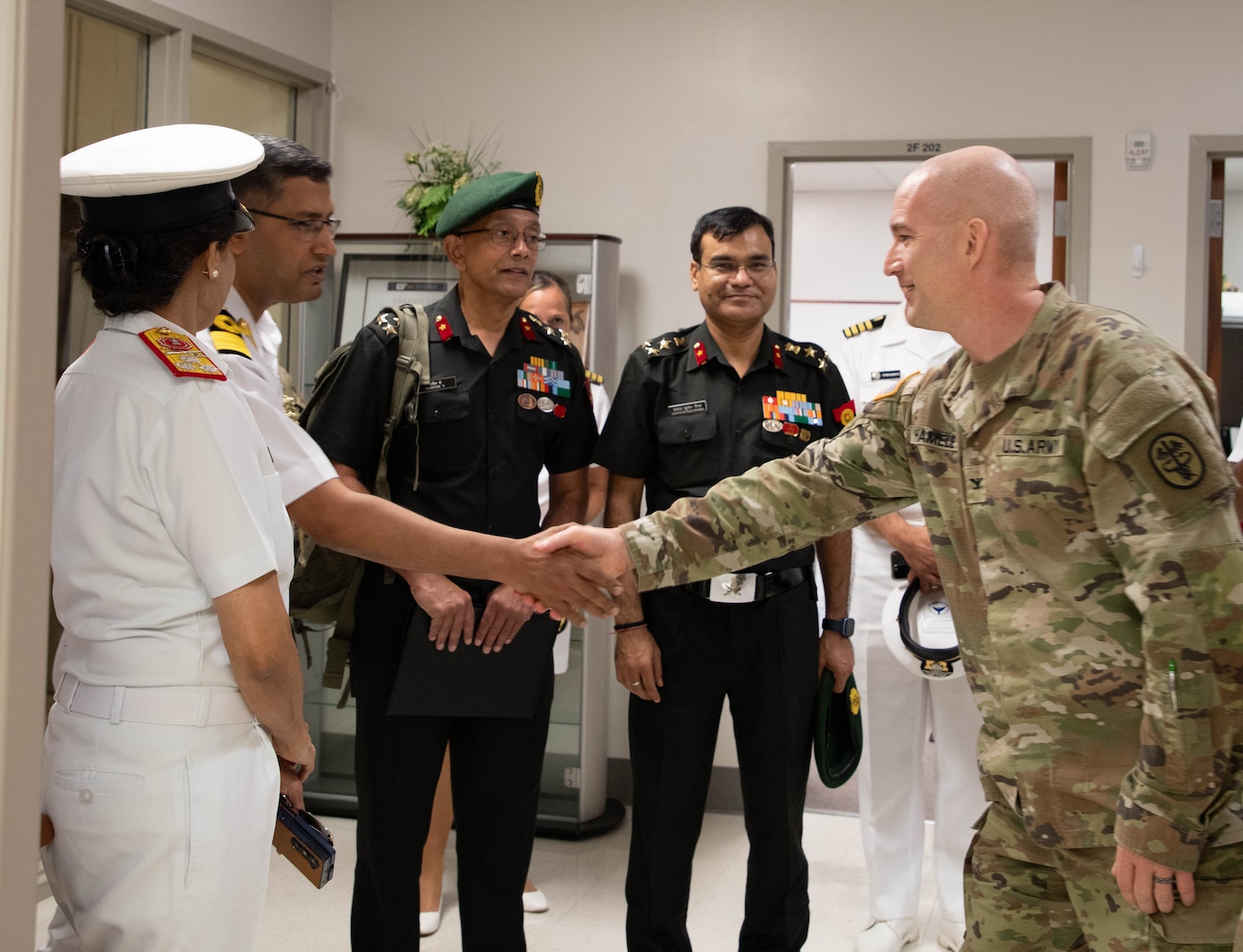 India’s Senior Medical Leaders meet with U.S. Army Col. Mitch Hamele, deputy director of academics, research and training at Tripler Army Medical Center, during a tour of the Ruth Andrews Simulation Center on Sept. 18, 2025. Staff demonstrated the center’s capabilities, highlighting programs that effectively train soldiers and prepare them for deployment through realistic, scenario-based training, advanced medical techniques and adaptability training for deployed environments. (Defense Health Agency photo by Khinna Kaminske)