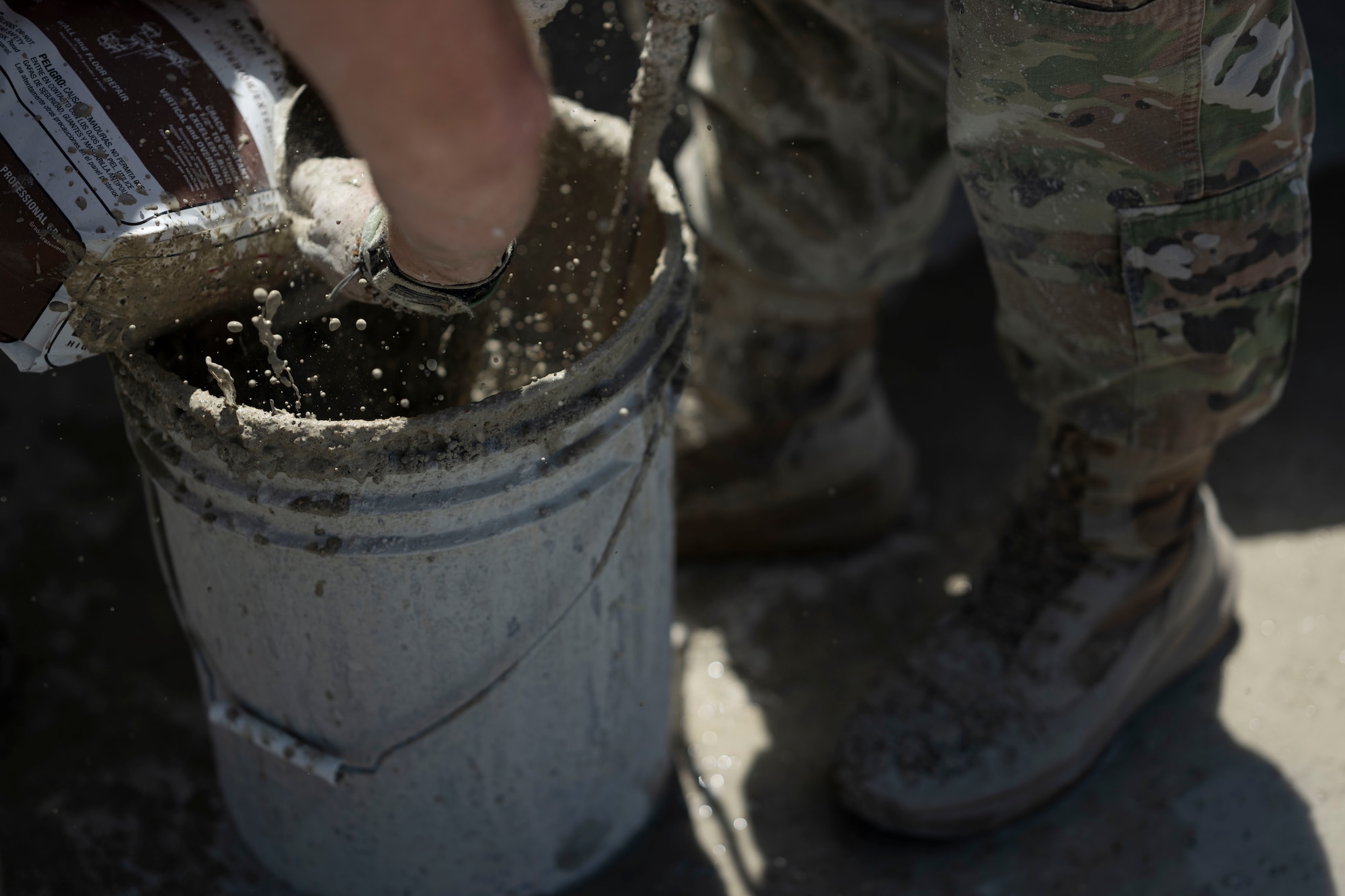 Airmen assigned to the 723d Combat Air Base Squadron mix concrete at Tyndall Air Force Base, Fla., Sept. 15, 2025.