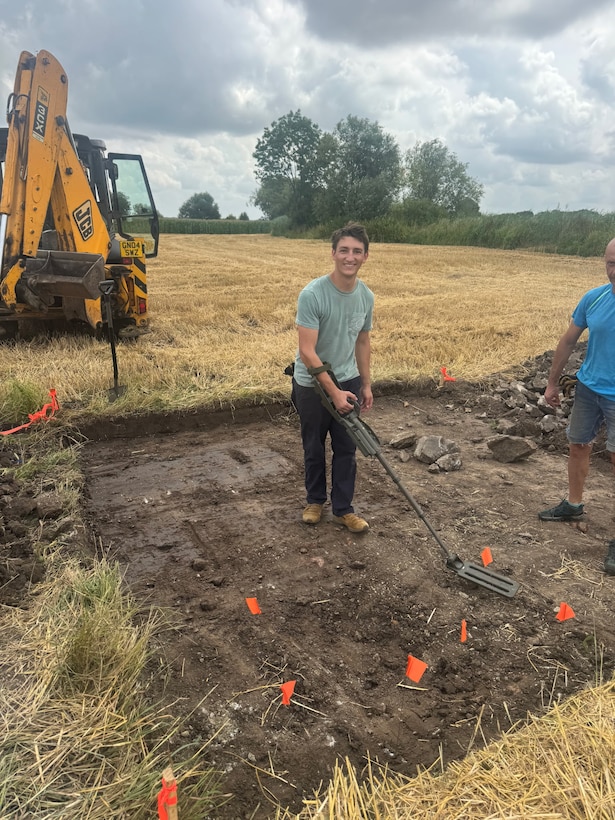 Zachariah Ellwanger, an Army ROTC cadet from the University of Arizona shovels dirt in Poland, July 26, 2025.