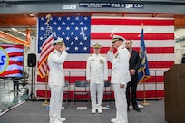 Capt. Jason Geddes, left, commander, Unmanned Undersea Vehicle Group (UUVGRU) 1, is relieved by Capt. Michael Dolbec during a change of command ceremony at Naval Base Kitsap-Keyport, Wash., June 14, 2024. During the ceremony, Dolbec, from Manchester, N.H., relieved Geddes, from Indianapolis, as commander, UUVGRU 1. (U.S. Navy photo by Mass Communication Specialist 2nd Class Victoria Galbraith)
