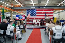 Capt. Michael Dolbec, commander, Unmanned Undersea Vehicle Group (UUVGRU) 1, unveils the command’s new logo during a change of command ceremony at Naval Base Kitsap-Keyport, Wash., June 14, 2024. During the ceremony, Dolbec relieved Capt. Jason Geddes as commander, UUVGRU 1. (U.S. Navy photo by Mass Communication Specialist 2nd Class Victoria Galbraith)