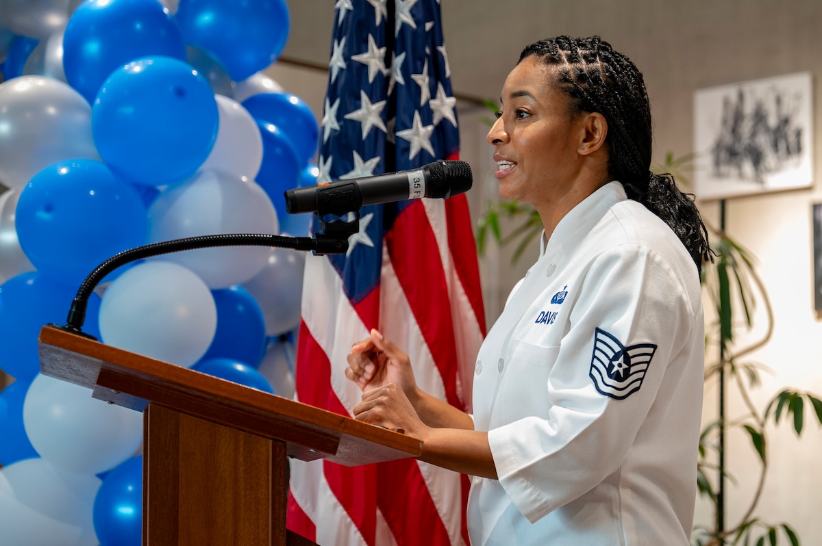 U.S. Air Force Tech. Sgt. Jazmen Davis, 35th Force Support Squadron dining facility manager, gives opening remarks during a 78th Air Force birthday celebration at Misawa Air Base, Japan, Sept. 18, 2025.