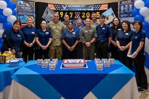 Members at Misawa Air Base pose for a group photo during a 78th Air Force birthday celebration at Misawa Air Base, Japan, Sept. 18, 2025.