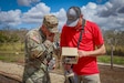 U.S. Army Master Sgt. Anthony Verdeja examines an unexploded ordnance detector during the 2025 xTech Pacific competition, September 10, 2025, Schofield Barracks, Hawaii. The Army's xTech program is the Army's premier mechanism for scouting and accelerating dual-use technologies that strengthen Soldier readiness and mission success. (U.S. Army photo by Staff Sgt. Alvin Conley)