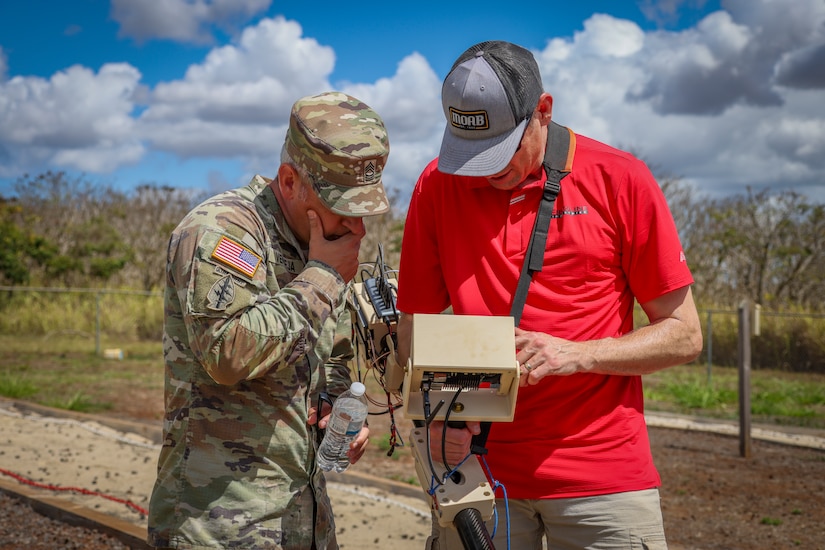 U.S. Army Master Sgt. Anthony Verdeja examines an unexploded ordnance detector during the 2025 xTech Pacific competition, September 10, 2025, Schofield Barracks, Hawaii. The Army's xTech program is the Army's premier mechanism for scouting and accelerating dual-use technologies that strengthen Soldier readiness and mission success. (U.S. Army photo by Staff Sgt. Alvin Conley)