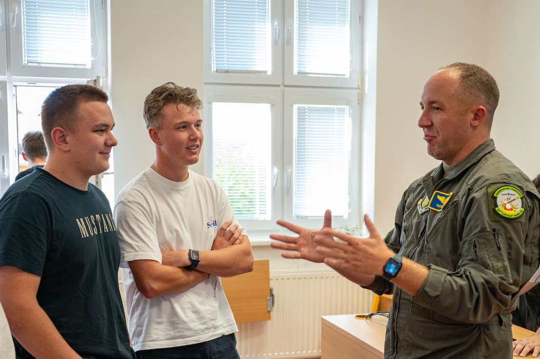 U.S. Air Force Master Sgt. Christopher Bankson, 307th Bomb Wing avionics specialist, talks to students about his experiences in the military at a local school in Ostrava, Czech Republic, Sept. 19, 2025. These visits strengthen community ties with NATO Allies and partners and coincide with the NATO Days air show in Ostrava, Czech Republic. (U.S. Air Force photo by Capt. Cody Burt)