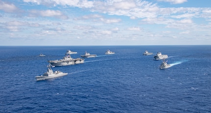 250720-N-FC892-1266 CORAL SEA (July 20, 2025) U.S. Navy ships from the America Strike Group, led by the forward-deployed amphibious assault ship USS America (LHA 6), sail in formation with Royal Australian Navy, Republic of Korea Navy, Royal New Zealand Navy, French Navy and Japan Maritime Self-Defense Force as part of Talisman Sabre 25, July 20. Talisman Sabre is the largest bilateral military exercise between Australia and the United States advancing a free and open Indo-Pacific by strengthening relationships and interoperability among key allies and partners, while enhancing our collective capabilities to respond to a wide array of potential security concerns. (U.S. Navy photo by Mass Communication Specialist 2nd Class Cole Pursley)