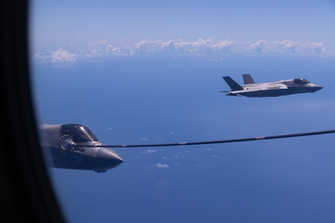 U.S. Marine Corps F-35B Lightning II jets with Marine Fighter Attack Squadron (VMFA) 242 prepare to receive fuel from U.S. Air Force MC-130J Commando II from the 353rd Special Operations Wing over the Pacific Ocean off the coast of southern Japan, Sept. 9, 2025. An aerial refueling exercise was conducted to demonstrate the Air Forces’ capabilities to members of the Japan Air Self-Defense Force during Rescue Flag 25. (U.S. Marine Corps photo by Lance Cpl. Ella Cadby)