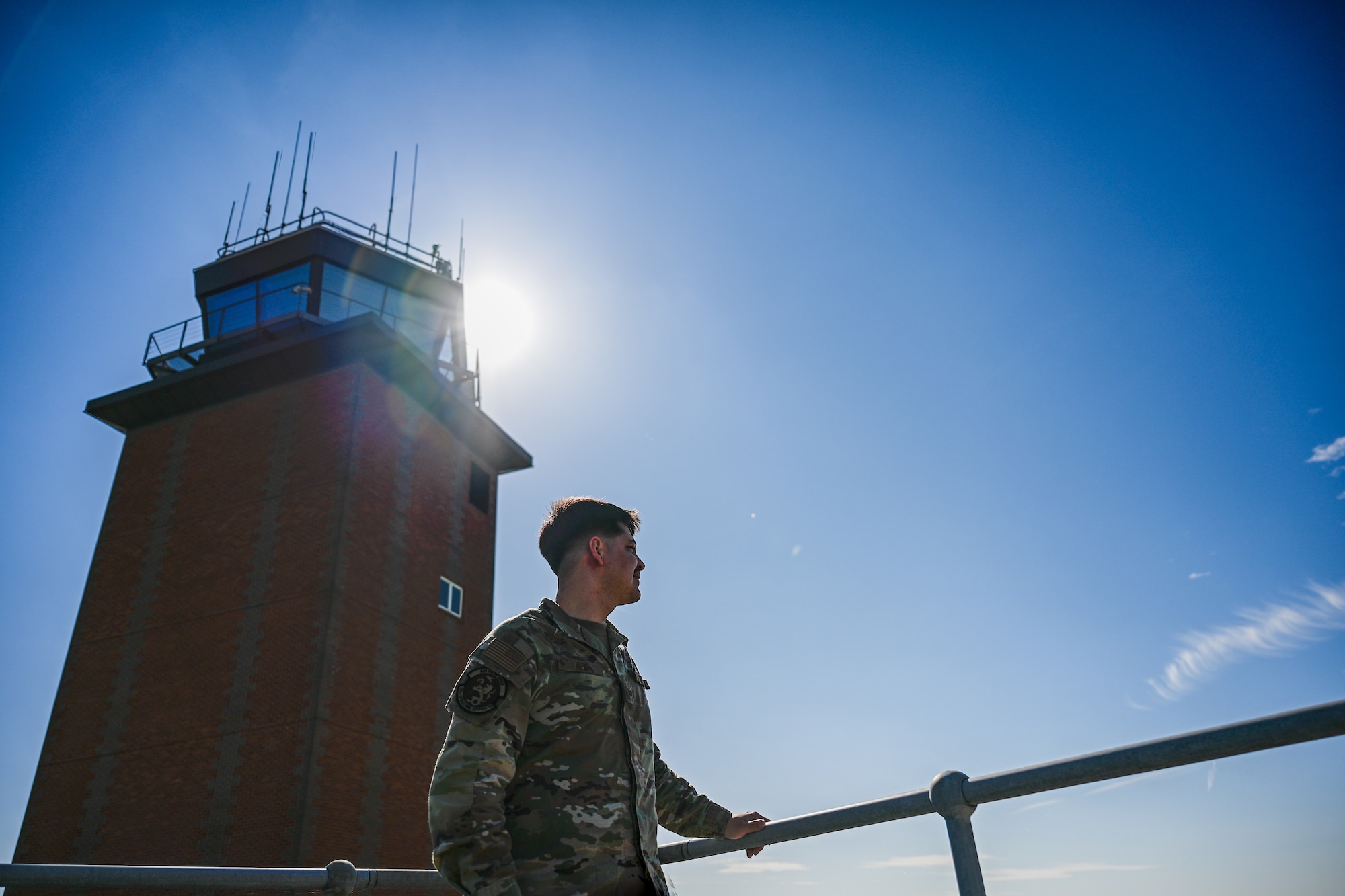 U.S. Air Force Staff Sgt. Patrick New, 100th Operations Support Squadron weather craftsman, stands on the observation deck on RAF Mildenhall, England, Sept. 19, 2025.