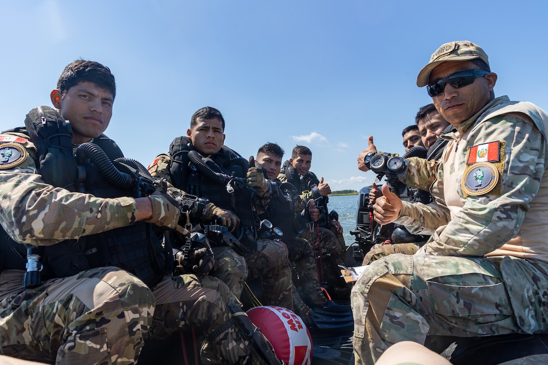 Marines with Infanteria de Marina del Peru (Peruvian naval infantry) pose for a photo while conducting dive operations as part of exercise UNITAS 2025 at Marine Corps Base Camp Lejeune, North Carolina, Sept. 18, 2025. UNITAS, which is Latin for “unity,” was conceived in 1959 and has taken place annually since first conducted in 1960. This marks the 66th iteration of the world’s longest running annual multinational maritime exercise. (U.S. Marine Corps photo by Lance Cpl. Jack Labrador)