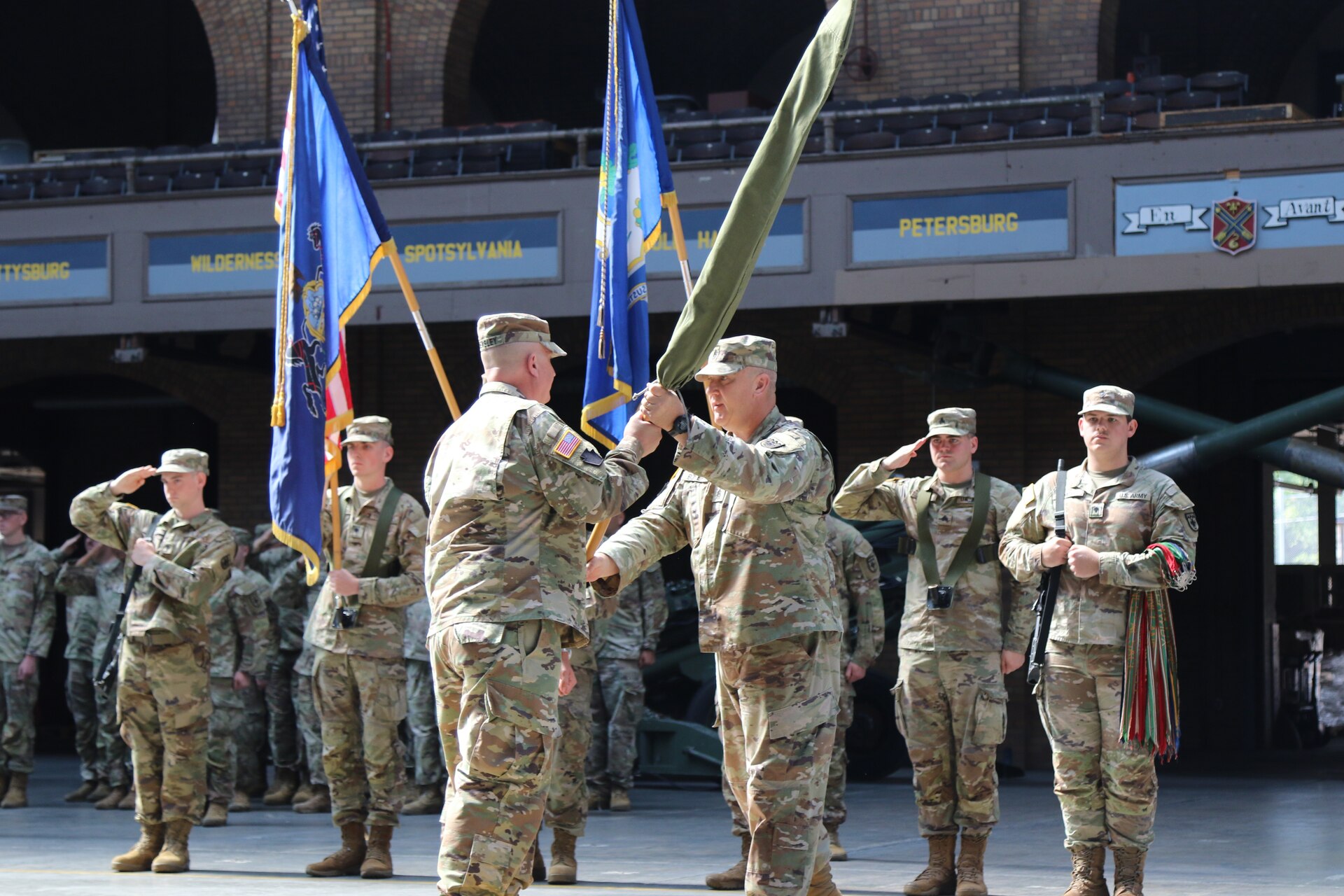 The Pennsylvania Army National Guard held a ceremony at the Kingston Armory in Wilkes-Barre, Pa. Sept. 14, 2025 to mark a significant moment in the organization's history. The 1st Battalion, 109th Field Artillery Regiment, a storied unit dating back to 1775, was deactivated. The Regiment's colors were cased during a time-honored tradition to symbolize the conclusion of its active service. After, the 28th Division Artillery was reactivated, reestablishing a critical component of the 28th Infantry Division's combat power. (U.S. Army National Guard photos by Sgt. 1st Class Shane Smith)