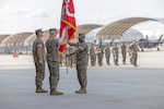 U.S. Marine Corps Sgt. Maj. Steven E. Buckom, from North Carolina, command senior enlisted leader, Marine All-Weather Fighter Attack Squadron (VMFA(AW)) 224, passes the Marine Corps colors to Lt. Col. Jarrod Allen, from California, the outgoing commanding officer of VMFA(AW)-224, during a squadron redesignation and change of command ceremony at Marine Corps Air Station Beaufort, South Carolina, June 26. The ceremony represented the squadron's transition from an all-weather F/A-18D Hornet squadron to an F-35B Lightning II squadron and signified the transfer of responsibility, authority, and accountability from Allen to Lt. Col John P. Stuart.