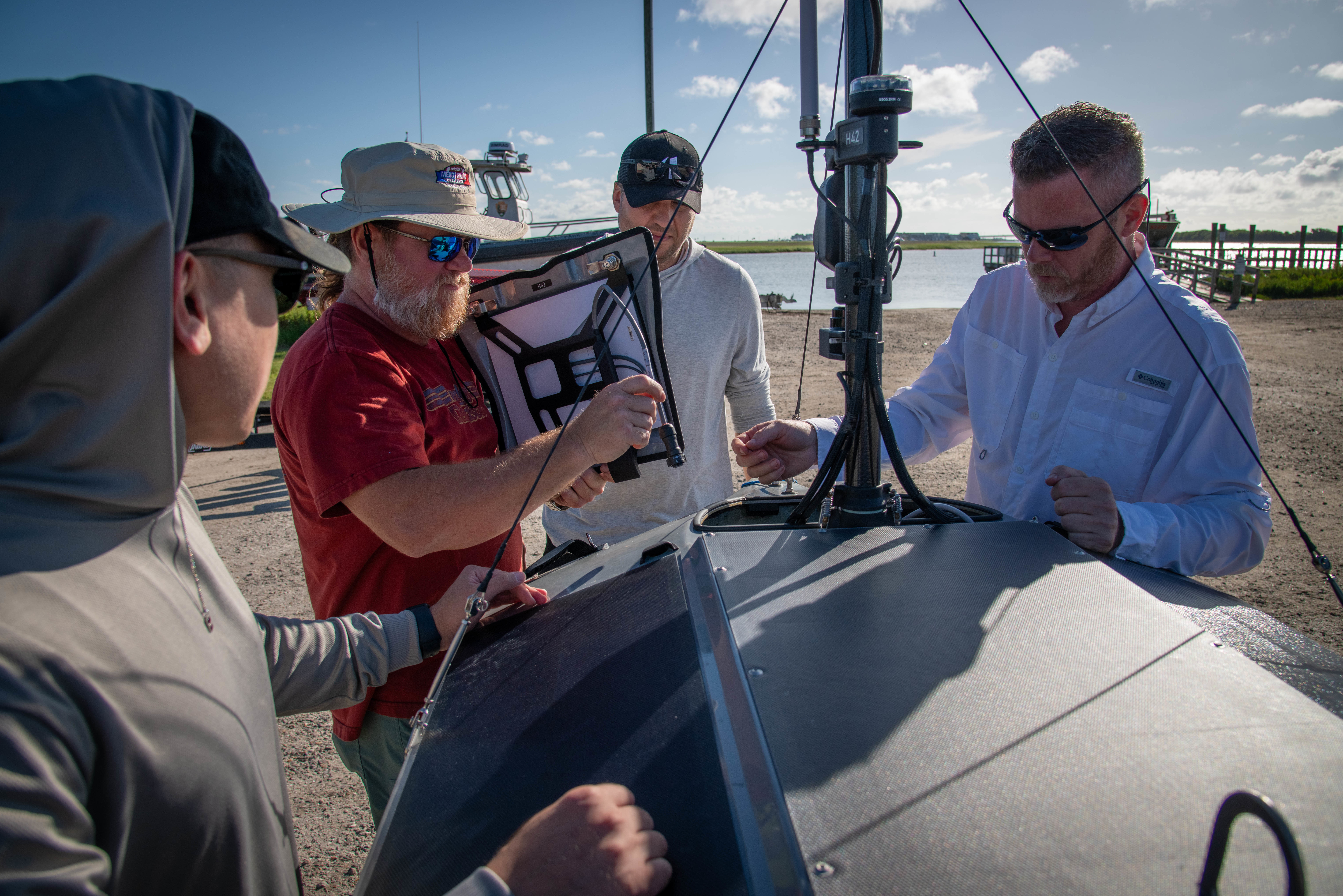 Sullivan’s Island, SC (June 30, 2025) Engineers with Naval Information Warfare Center (NIWC) Atlantic's Unmanned Naval Innovation Team (UNIT) launched an Unmanned Surface Vessel (USV) in late June to attempt the first-ever transatlantic crossing by a self-driven boat. The USV took to the sea out of Sullivan's Island, South Carolina, bound for Portugal - a trip that is expected to take more than 60 days to accomplish. UNIT engineers will be collecting, monitoring and analyzing data collected from the USV's onboard sensors as it makes its way across the ocean, providing a valuable proving ground for future capabilities. (U.S. Navy photo by Joe Bullinger/Released)