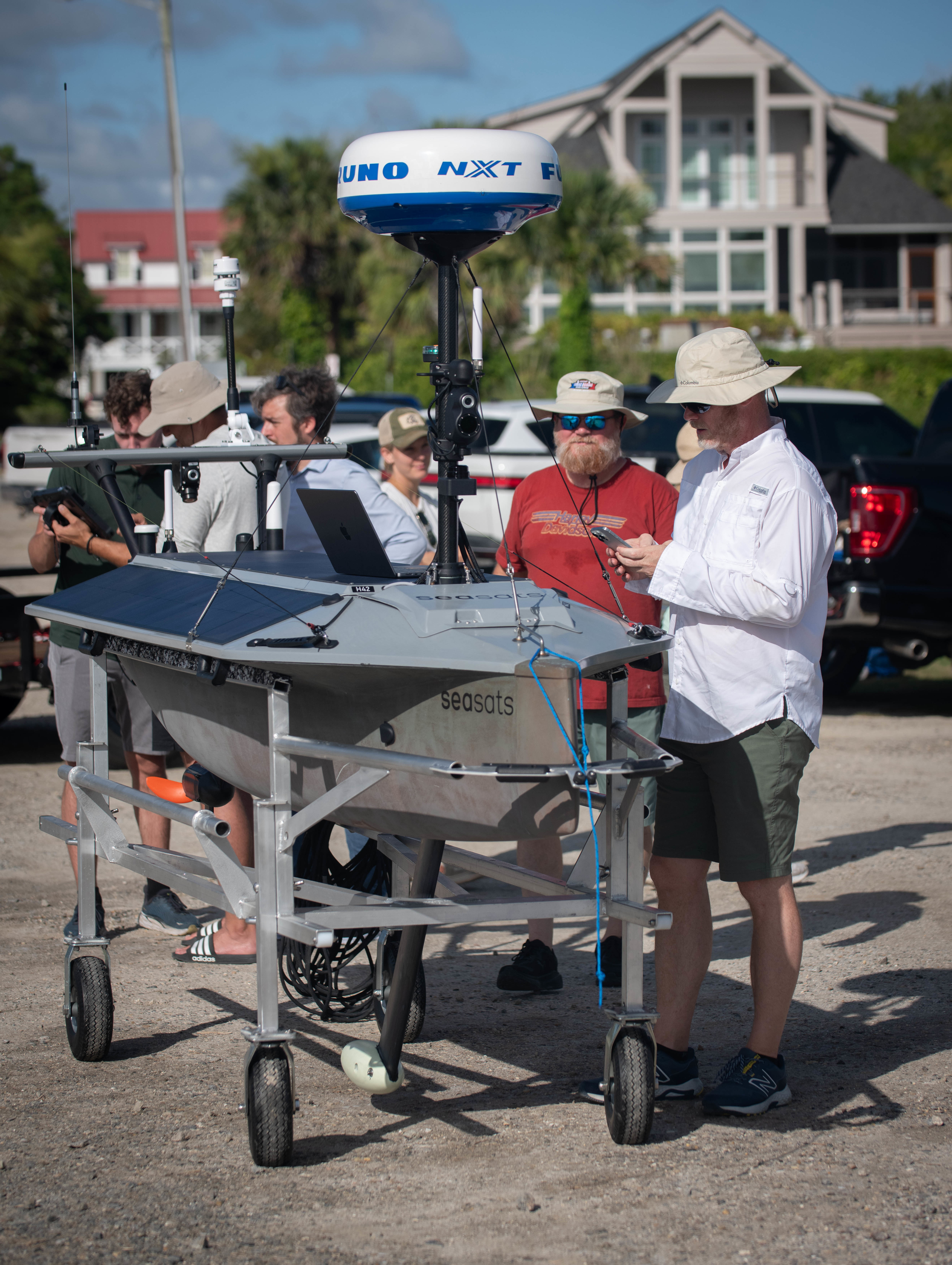 Sullivan’s Island, SC (June 30, 2025) Engineers with Naval Information Warfare Center (NIWC) Atlantic's Unmanned Naval Innovation Team (UNIT) launched an Unmanned Surface Vessel (USV) in late June to attempt the first-ever transatlantic crossing by a self-driven boat. The USV took to the sea out of Sullivan's Island, South Carolina, bound for Portugal - a trip that is expected to take more than 60 days to accomplish. UNIT engineers will be collecting, monitoring and analyzing data collected from the USV's onboard sensors as it makes its way across the ocean, providing a valuable proving ground for future capabilities. (U.S. Navy photo by Joe Bullinger/Released)