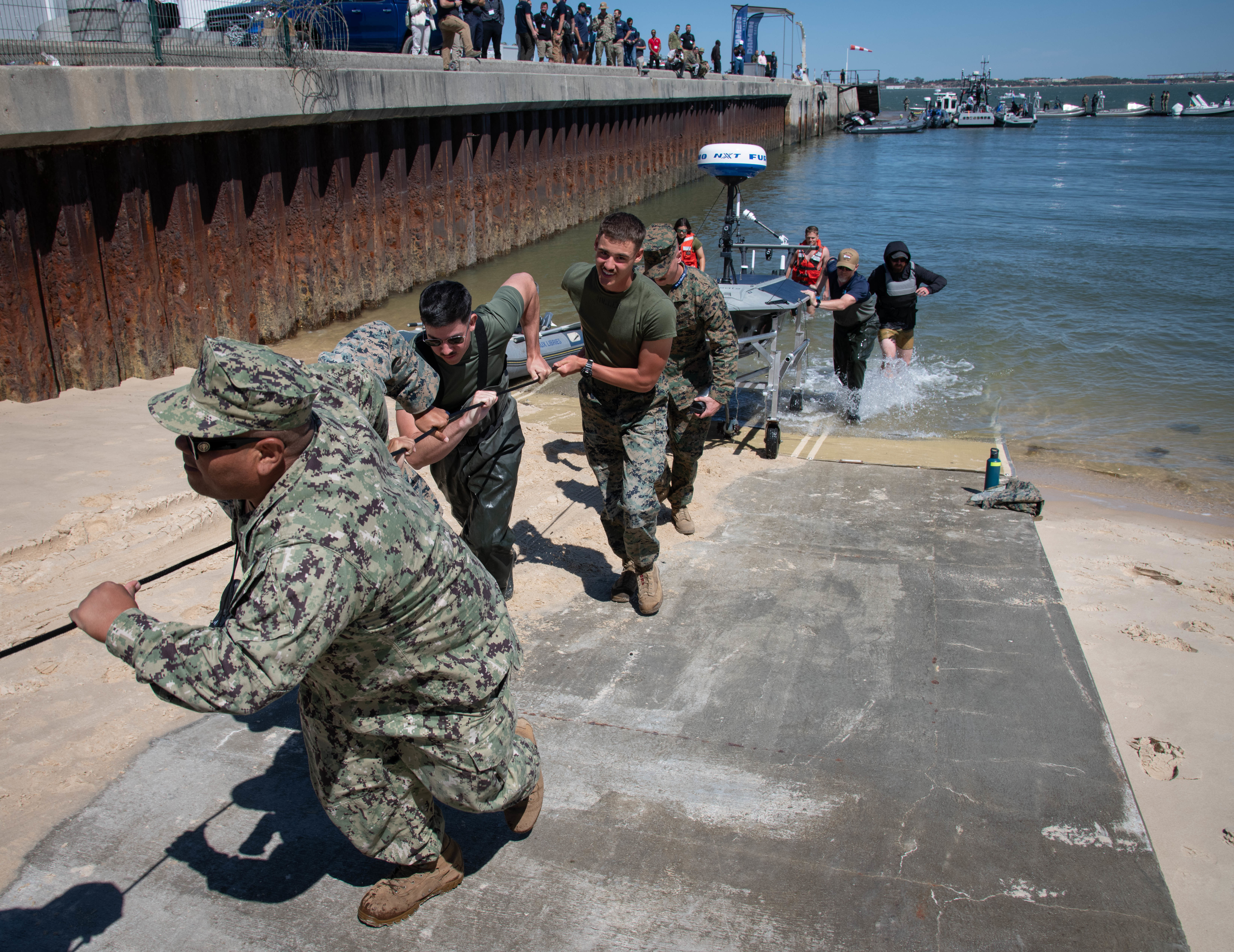 Troia, Portugal (September 9, 2025) Naval Information Warfare Center (NIWC) Atlantic successfully completed the first-ever known transatlantic crossing of an unmanned surface vessel (USV) Sept. 9, 2025, as it arrived in Troia, Portugal. The Lightfish USV completed a roughly 90-day crossing, which launched from Sullivan's Island, South Carolina, on June 30, 2025. NIWC Atlantic's Unmanned Naval Innovation Team (UNIT) monitored the vessel around the clock, tracking its progress and testing its communication capabilities throughout the journey. This is the first known time an unmanned vessel of any kind has successfully crossed the Atlantic Ocean completely remotely without any physical interference.