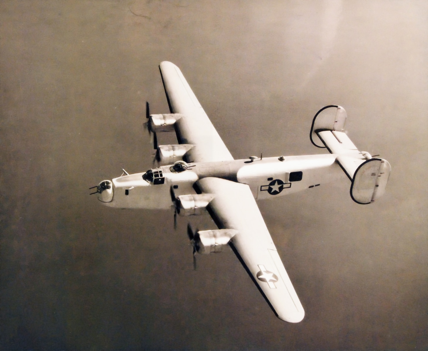 Although it wore a few different paint schemes in Navy service, this PB4Y-1 (B-24 in Army service) is all white, as were many of the PB4Y-1s that flew maritime reconnaissance missions in the Pacific late in the war, particularly over Hong Kong. The PB4Y-2 Privateer was a modification with a large single vertical tail replacing the B-24/PB4Y-1’s twin vertical tails.