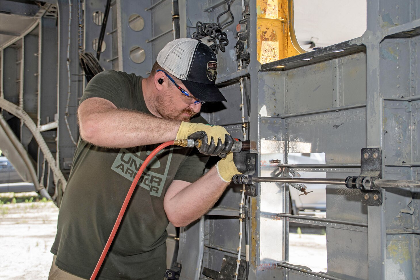 Aaron Weld, Fleet Readiness Center East (FRCE) H-53 work leader and member of the depot’s Forward Deployed Combat Repair (FDCR) Team, performs repairs on a CH-53E Super Stallion during a training exercise designed to enhance the aircraft maintenance and repair knowledge and capabilities the FDCR Team may need if deployed.