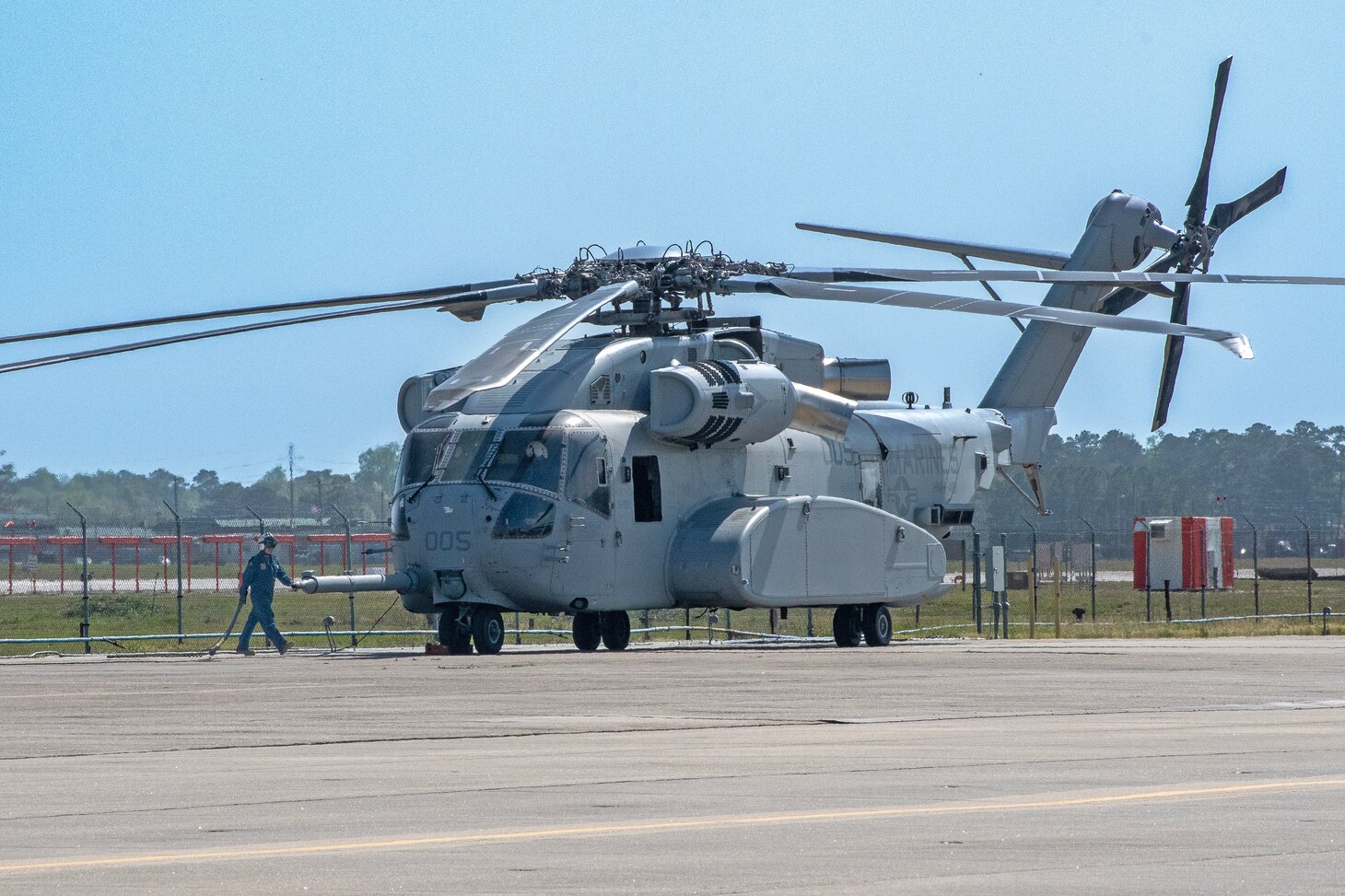 Marine Master Sgt. Richard Hughes, maintenance chief at Fleet Readiness Center East (FRCE), prepares to secure the rotor blades of a CH-53K King Stallion helicopter that arrived at the depot April 4 for routine maintenance. FRCE inducted the aircraft April 17 as the first of 14 planned for induction as part of the Age Exploration Program, Depot (AEPD); it is the first King Stallion ever inducted for depot-level maintenance. AEPD collects information regarding the aircraft’s condition through controlled testing and analysis and assists in the development of effective and efficient maintenance schedule for new aircraft.