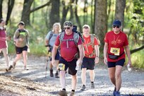 U.S. service members, veterans, Gold Star Families and community members participate in the 14th annual March for the Fallen at Fort Indiantown Gap, Pennsylvania, Sept. 20, 2025. March for the Fallen is a community event held each year at Fort Indiantown Gap to honor the memory of those who have fallen in defense of our nation. It is open to the public and registrants choose to participate in one of various challenges, including a 28-mile ruck march, a 14-mile ruck march, a 5K run/walk or 28-mile hand cycle. The 28- and 14-mile course follows a path around Fort Indiantown Gap’s training areas. (U.S. Army National Guard photo by Maj. Travis Mueller)