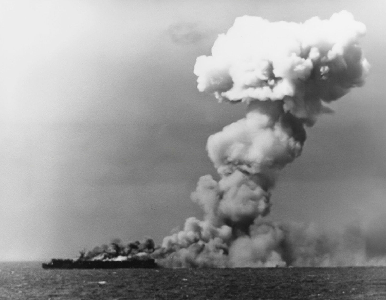 USS Princeton (CVL 23) was hit by an attacking radial-engined D4Y1 Judy’s 500-pound bomb on Oct. 24, 1944. After a valiant struggle to save her, the ship’s crew abandoned their carrier. After which, it was decided to scuttle the ship, and the disagreeable task fell to several ships in the task force, including the light cruiser USS Reno (CL 62). First, the destroyer USS Irwin (DD 794) fired its 5-inch guns, but it was the Reno’s two torpedoes that, after they hit, as one sailor witness said, “Princeton literally disintegrated…” Casualties were listed as 373 killed, 552 wounded, four missing.