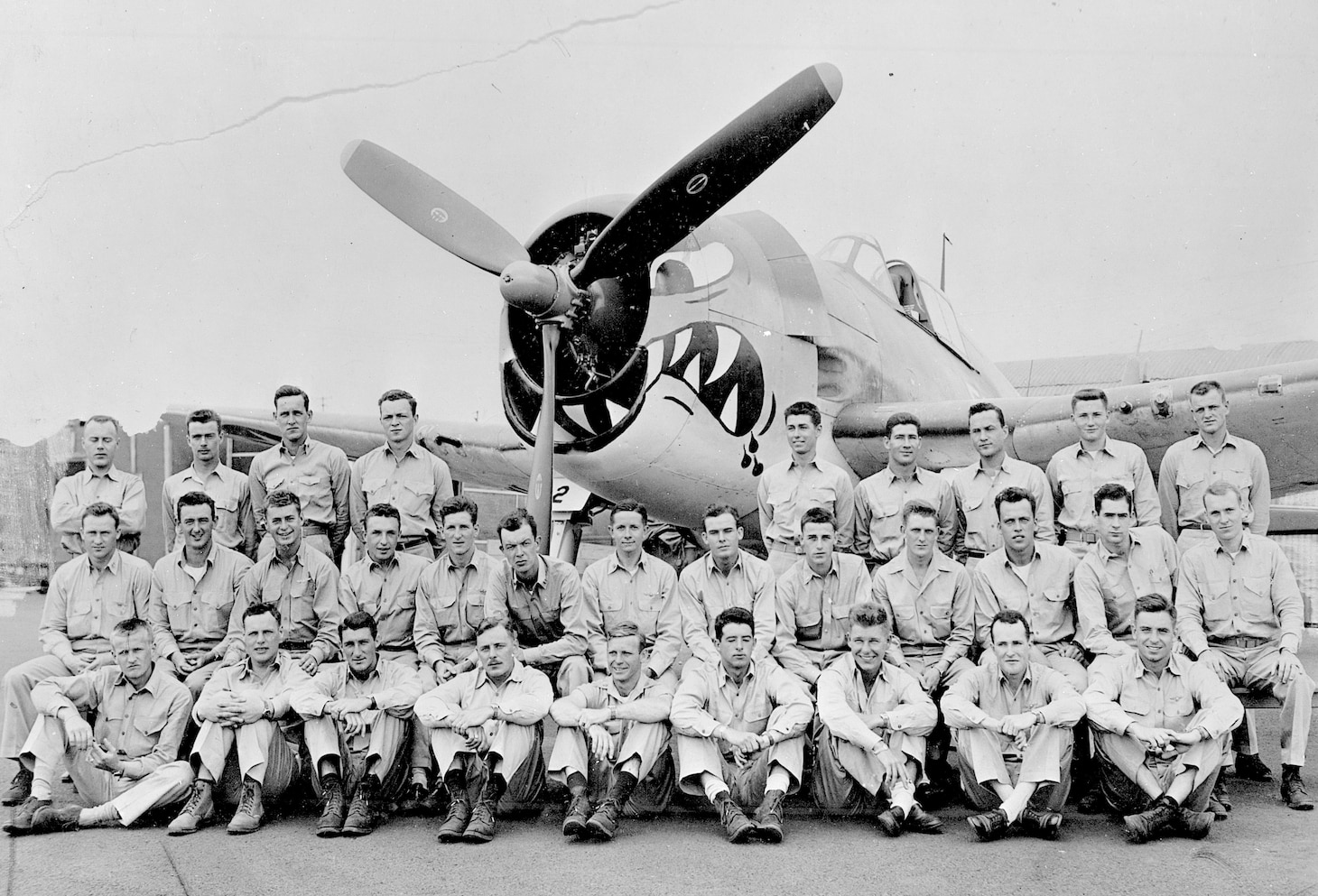Although U.S. Navy fighter squadrons were discouraged from placing too many personal and squadron decorations on their aircraft, VF-27 somehow overrode this restriction with a large tiger shark rendering that took several forms, the one in this photo proving to be the most popular.