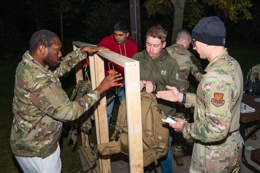 Ruck sacks are weighed at a weighing station.