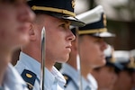 Coast Guard Academy stand in formation during a change of watch ceremony at the Coast Guard Academy, August 20, 2024. The ceremony marks the transition of the summer leadership team to the fall semester command. (U.S. Coast Guard photograph by Petty Officer 3rd Class Matt Thieme)
