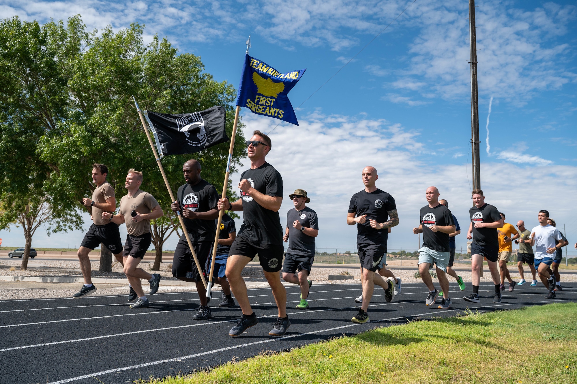 people running with flags