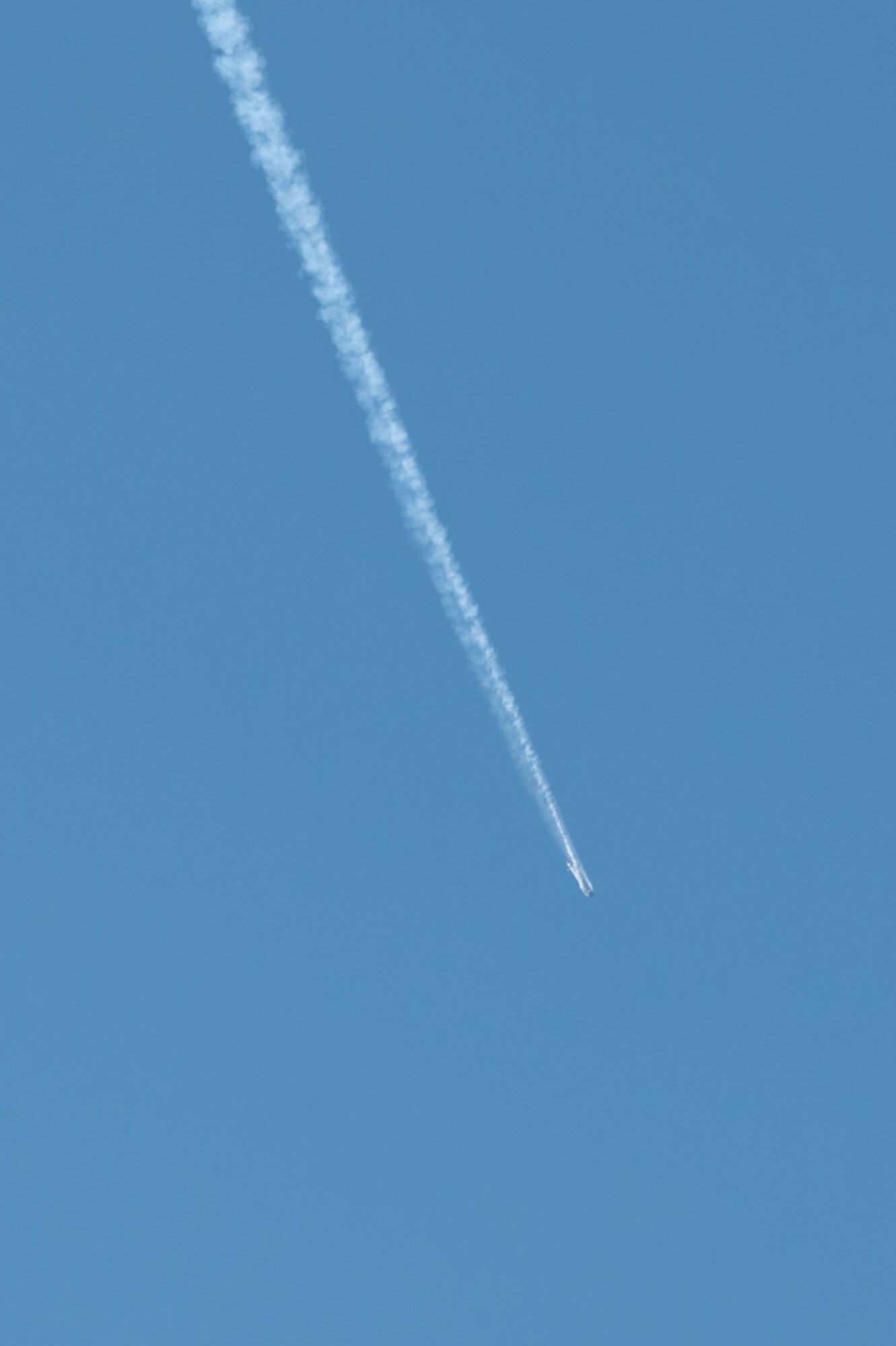 A rocket in the sky.