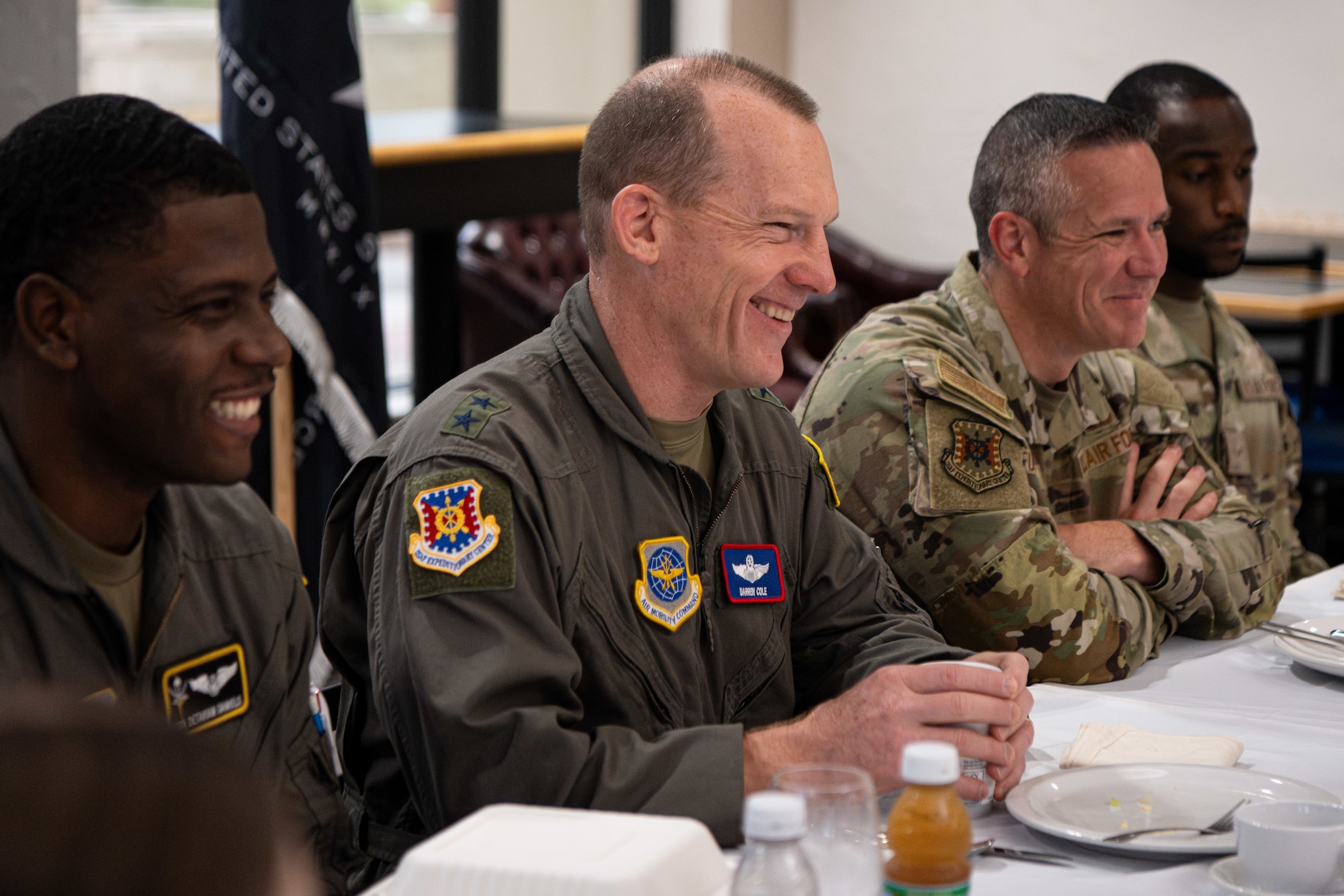 U.S. Air Force Maj. Gen. Darren Cole, 21st Air Force and U.S. Air Force Expeditionary Center commander, and Chief Master Sgt. Dennis Fuselier, 21st Air Force and U.S. Air Force Expeditionary Center command chief, have breakfast with junior enlisted Airmen at MacDill Air Force Base, Florida Sept. 17, 2025. Cole and Fuselier sought feedback from 6th Air Refueling Wing Airmen on their leadership and ability to operate in dynamic, complex and rapidly changing environments. (U.S. Air Force photo by Airman 1st Class Helen Ly)