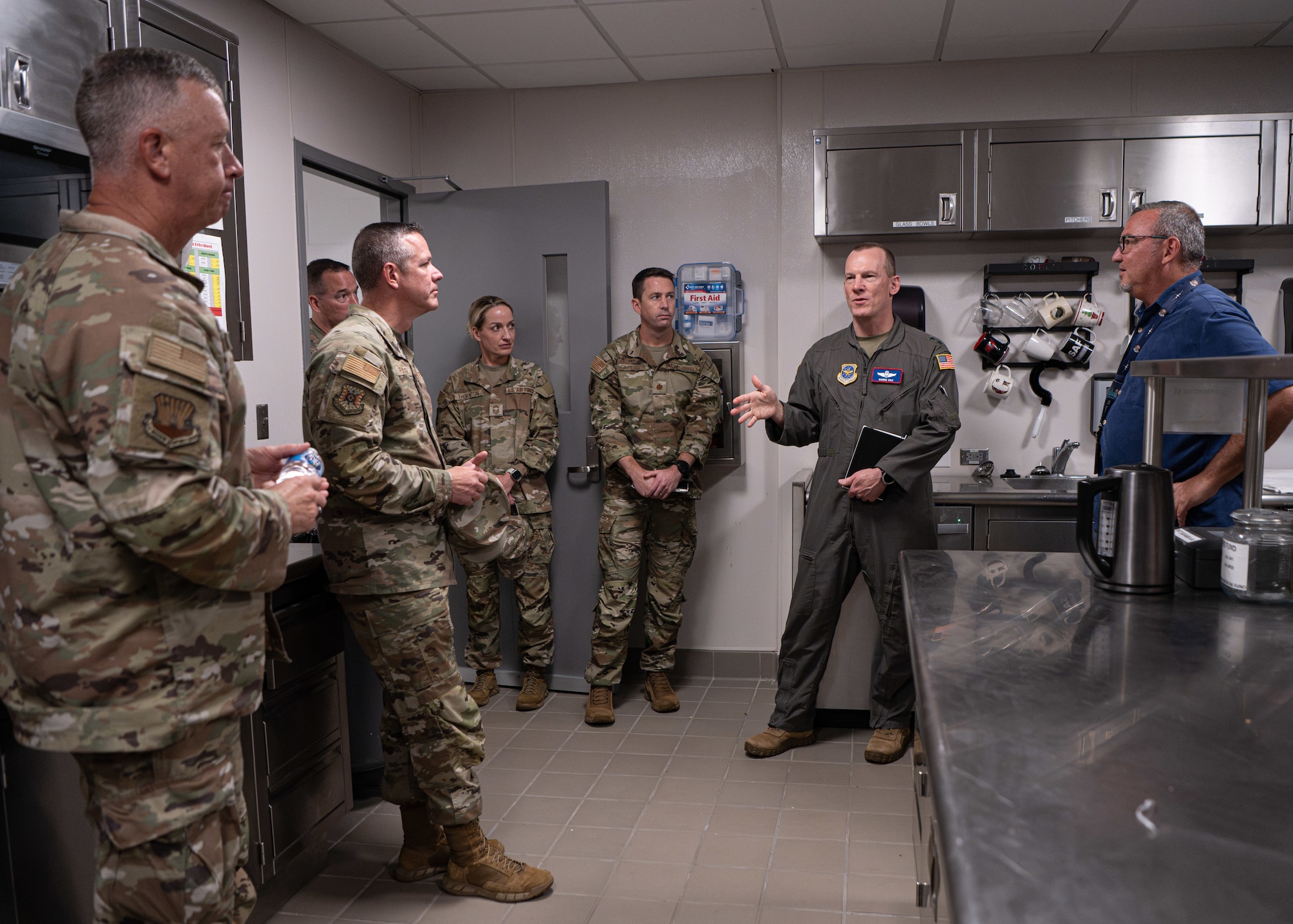 U.S. Air Force Maj. Gen. Darren Cole, 21st Air Force and U.S. Air Force Expeditionary Center commander, and Chief Master Sgt. Dennis Fuselier, 21st Air Force and U.S. Air Force Expeditionary Center command chief, tour mission critical facilities at MacDill Air Force Base, Florida Sept. 17, 2025. The installation's alert facility provides Airmen and joint partners with a centralized living space equipped with a gym, dining facility and rest areas, while supporting the 6th Air Refueling Wing’s no-fail deterrence mission. (U.S. Air Force photo by Airman 1st Class Helen Ly)