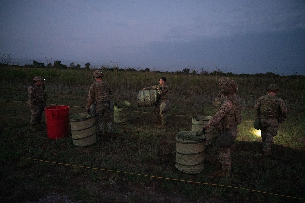 Airmen from Altus Air Force Base’s 97th Civil Engineer Squadron, Readiness and Emergency Management Flight set up a decontamination line at Fort Sill, Oklahoma, September 7, 2025. This event not only supported operations at Fort Sill—it also gave the Airmen of the 97th the opportunity to train newer members and demonstrate their capability to lead decontamination processes for a large formation. (U.S. Air Force photo by Tech. Sgt. Hailey Haux)