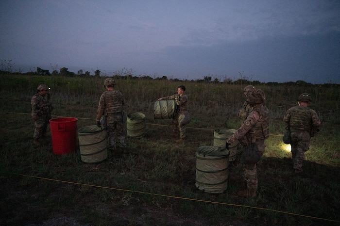 Airmen from Altus Air Force Base’s 97th Civil Engineer Squadron, Readiness and Emergency Management Flight set up a decontamination line at Fort Sill, Oklahoma, September 7, 2025. This event not only supported operations at Fort Sill—it also gave the Airmen of the 97th the opportunity to train newer members and demonstrate their capability to lead decontamination processes for a large formation. (U.S. Air Force photo by Tech. Sgt. Hailey Haux)