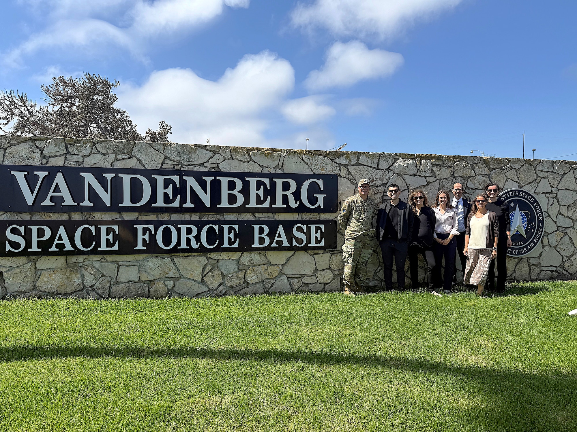 Members of the Governor's Office of Business and Economic Development (GoBiz) and Regional Economic Action Coalition (REACH) pose with U.S. Space Force Lt. Col Kyle Rowland, Chief of Spaceport Integration, prior to an infrastructure tour at Vandenberg Space Force Base, Calif., Sept. 12, 2025. During the tour, the group visited Vandenberg's mission areas, including United Launch Alliance, SpaceX, the Vandenberg harbor, and the base’s Mission Development Zone. GoBiz recently awarded a $9.5 million grant to the "Space Vandenberg" initiative, aimed at boosting space industry infrastructure in California and expanding workforce development. (U.S. Space Force Photo by Jennifer Green-Lanchoney)