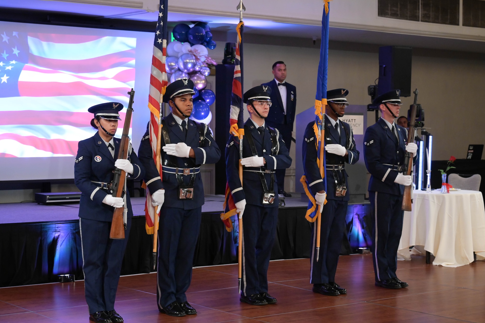 Honor guard presents the colors during a ceremony.