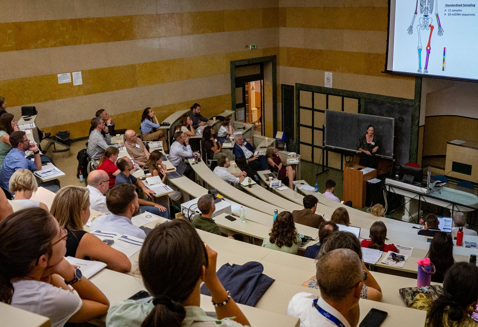 Dr. Carrie LeGarde, Defense POW/MIA Accounting Agency forensic anthropologist and scientific recovery expert spoke about the resolution and managing of commingled human remains during the fourth Scientific Summit in Milan, Italy, Sept. 18, 2025.
