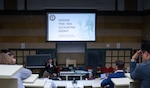 Scientists and representatives from 16 different countries listen to a briefing during the fourth Scientific Summit in Milan, Italy, Sept. 17, 2025.