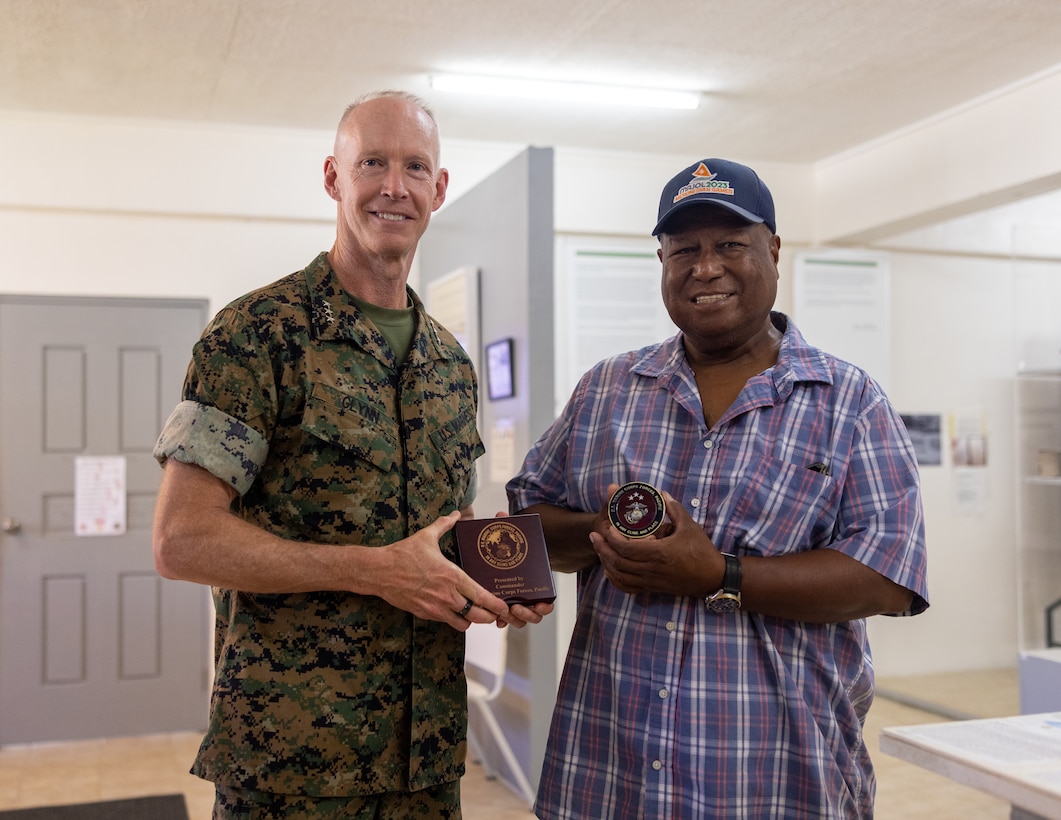 U.S. Marine Corps Lt. Gen. James F. Glynn, left, commander, U.S. Marine Corps Forces, Pacific, and Gov. Emais Roberts, left, governor of Peleliu, pose for a photo following a gift exchange in Peleliu, Palau, Sept. 7, 2025. Glynn traveled to Palau to observe operations, engage with local officials and Marines, and better understand the islands’ infrastructure, historic sites and facilities as part of a broader mission to reinforce multinational partnerships that support security and stability across the Indo-Pacific region. (U.S. Marine Corps photo by Lance Cpl. Chloe Zimmerer)