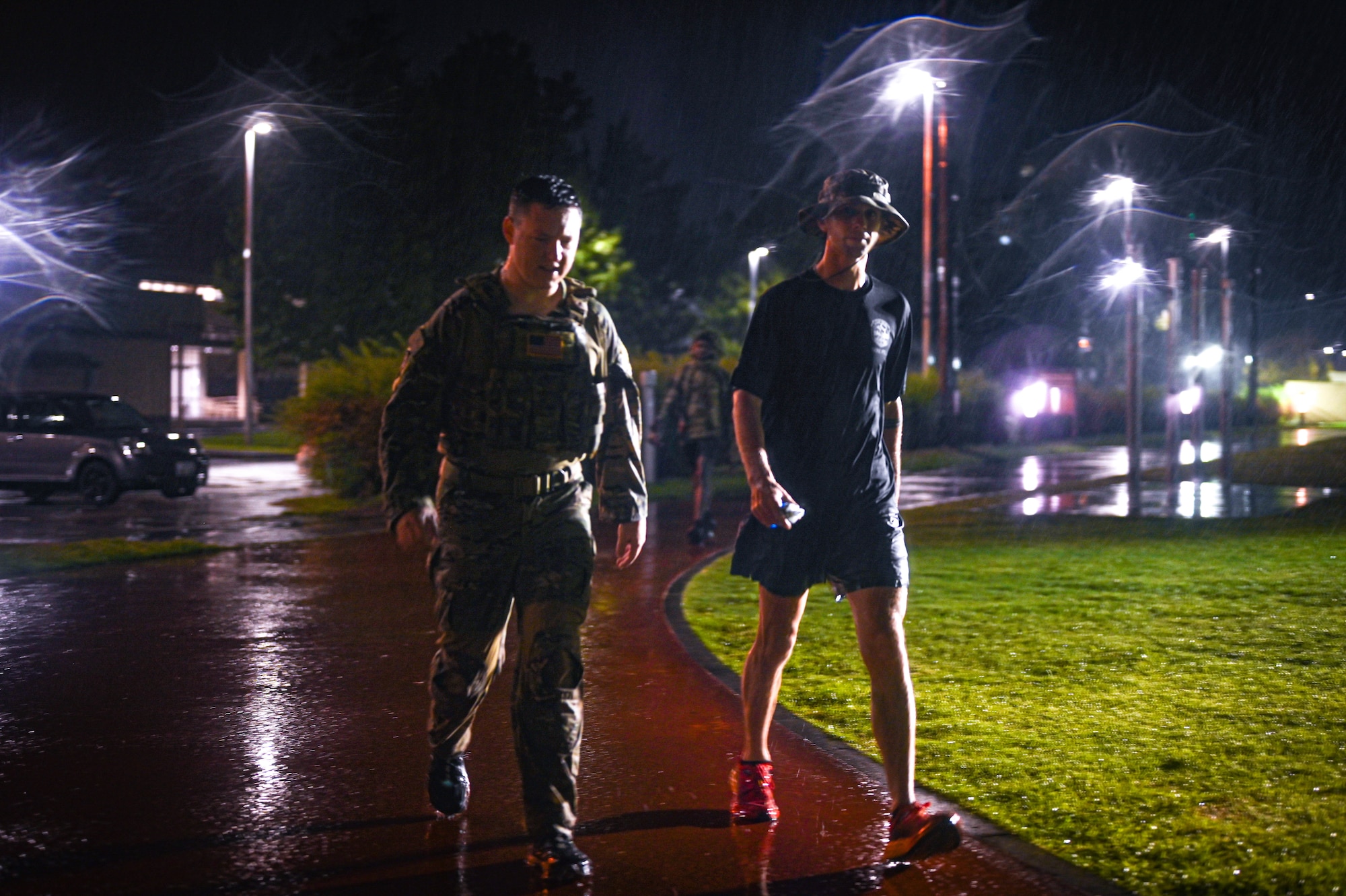 participants carry the POW/MIA flag during the POW/MIA Memorial Relay