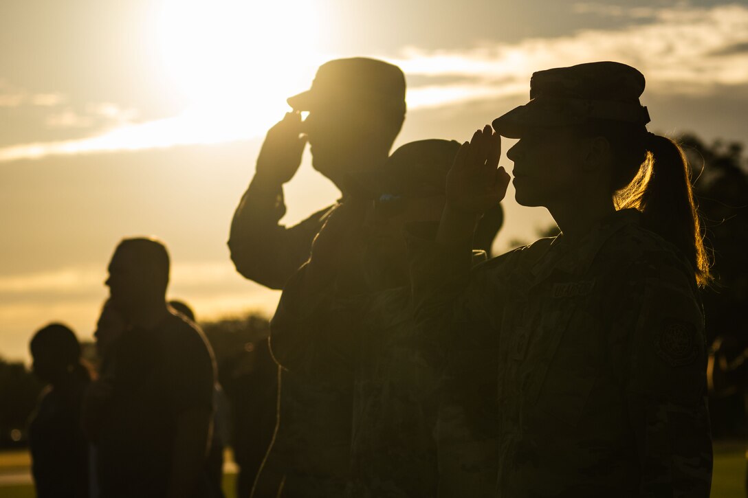 U.S. Air Force first sergeants assigned to the 6th Air Refueling Wing render salutes during the POW/MIA Recognition Day Opening Ceremony opening ceremony at MacDill Air Force Base, Florida, Sept. 18, 2025. The ceremony marked the start of the installation’s annual 24-hour run, during which the POW/MIA flag remains in constant motion throughout the night. (U.S. Air Force photo by Senior Airman Zachary Foster)